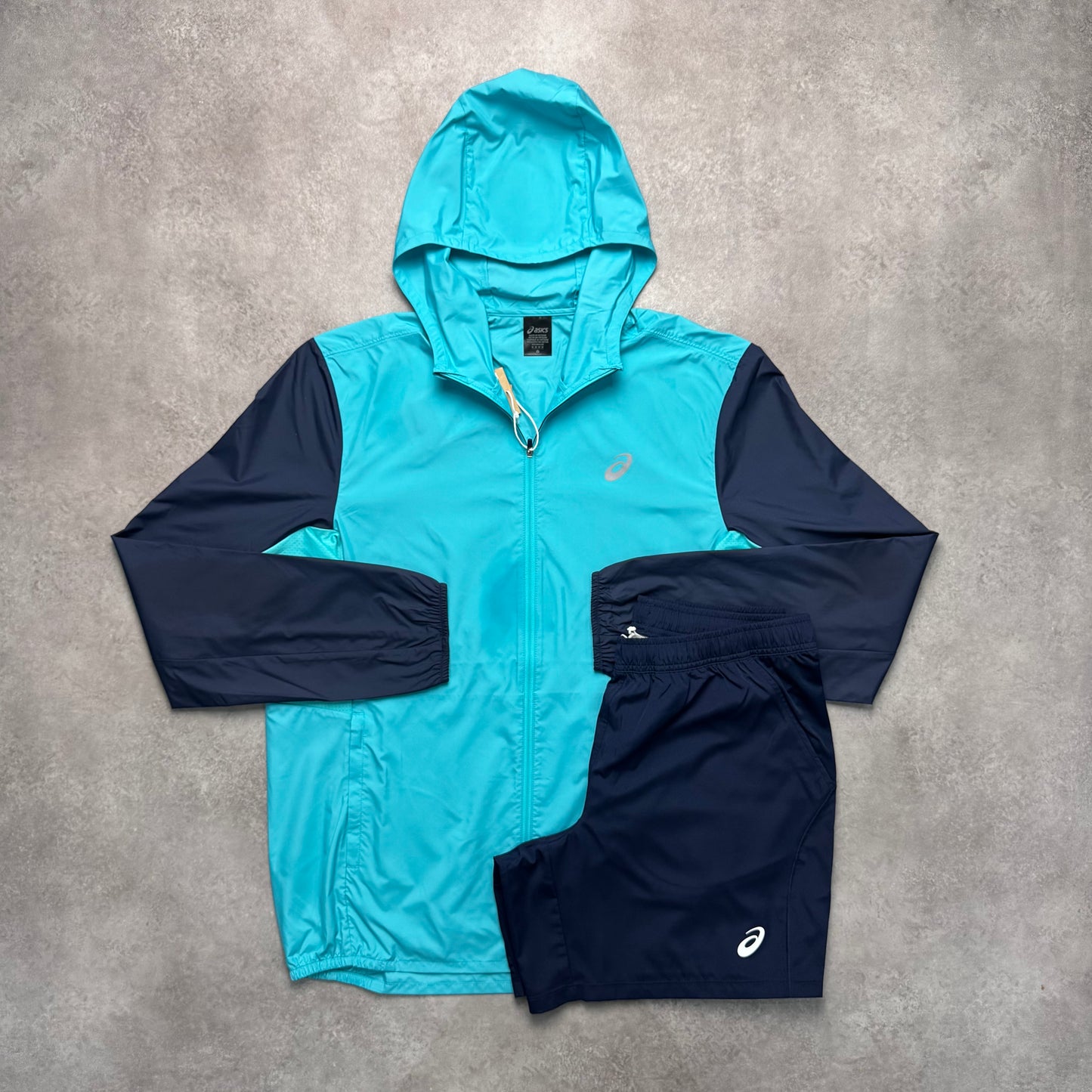 ASICS CORE WINDBREAKER SET - TWO TONE BLUE