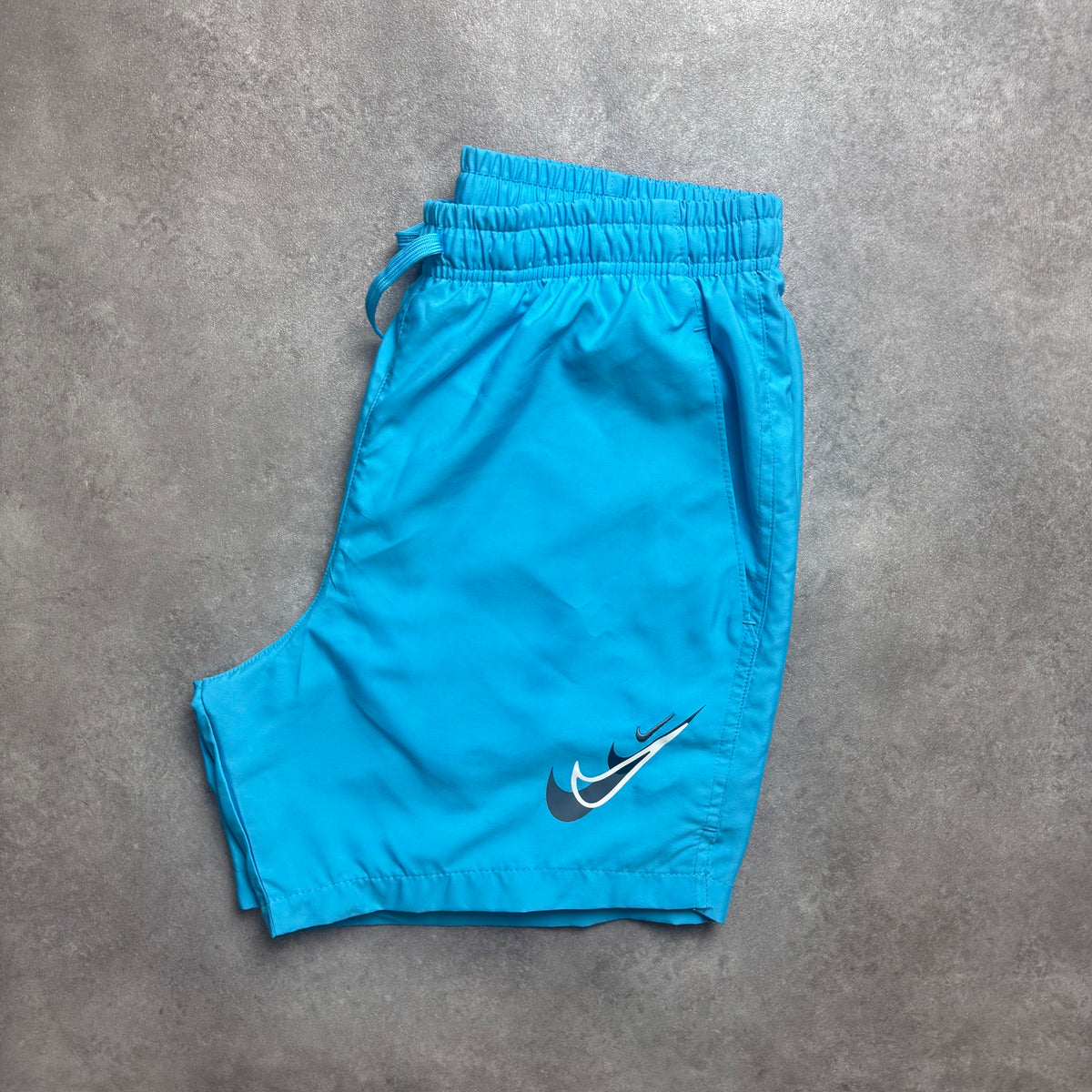 NIKE AIR SWOOSH SHORTS - BLUE